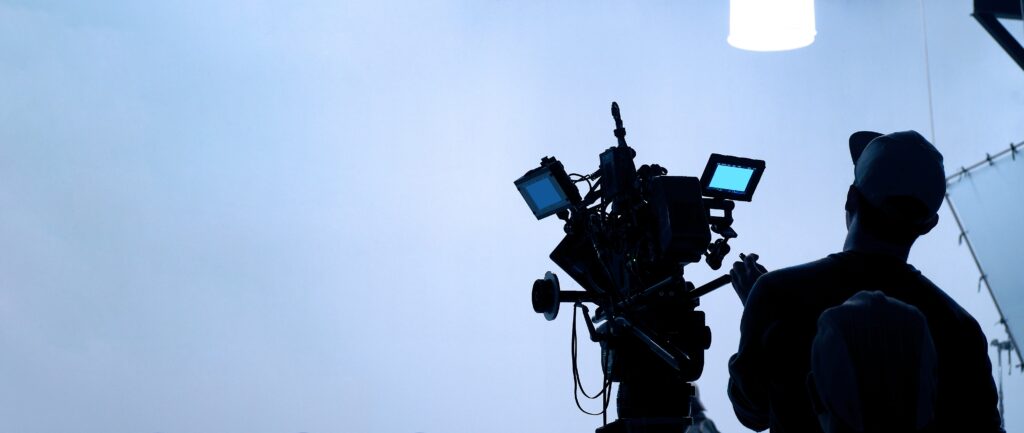 Video production behind the scenes. Making of TV commercial movie that film crew team lightman and c